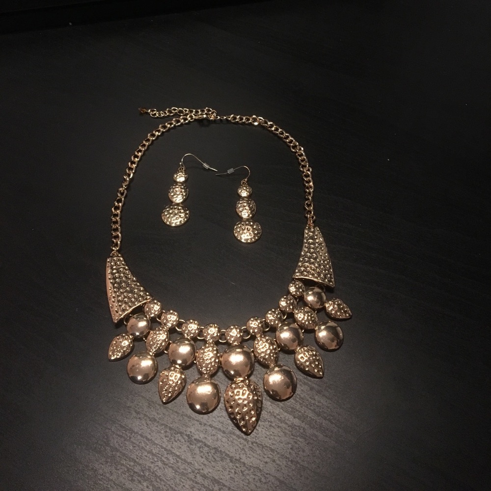 Gold necklace with gold earrings